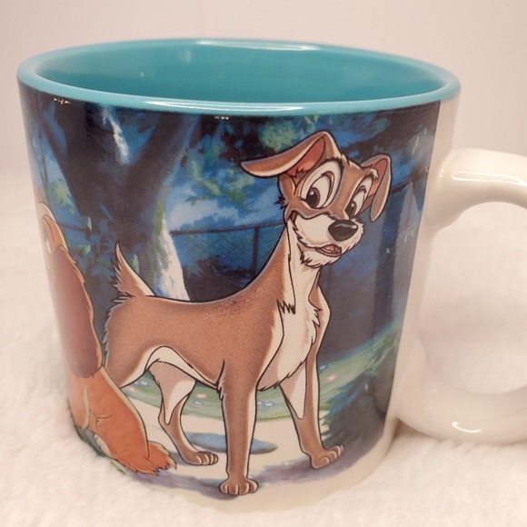 Disney Lady and the Tramp blue coffee mug zoo with tiny chip (see photo)… - Picture 1 of 6